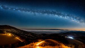 Minimal night landscape starry sky, crescent, hills