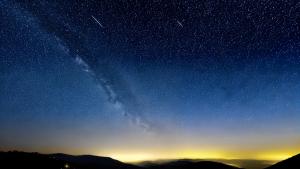 Minimal night landscape starry sky, crescent, hills