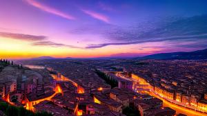 purple sunset above an Italian city