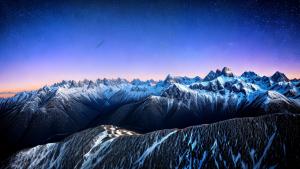 Snowy mountains in the night