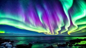 Northern lights, night sky, icy ocean