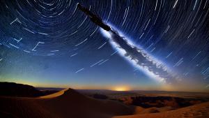 Star trails above the desert timelapse photo