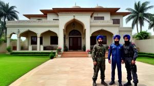 rich home with z    security and thundering weather with fighter plane in sky and commando in home and a sikh boy standing in gardan