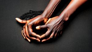 a black holle and hands