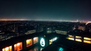 Batman on a rooftop in the rain at night