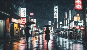 Jdm and Japanese girl in Tokyo night time and raining