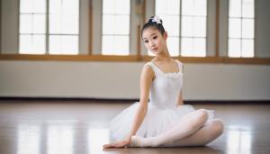 Created a photo of a beautiful and gorgeous Japanese high school girl ballerina. The background is a ballet class. Wearing a pure white chuchubon ballet costume. Wear a short skirt. Wearing white tights. Her hair is brown. The model is sitting on the floor. Please include the model's entire body in the photo. The model's legs are long, slender and beautiful.