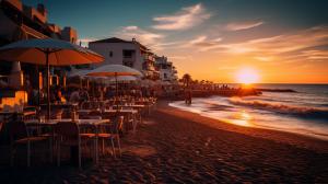 Sunset over a Spanish beach, with authentic restaurants.