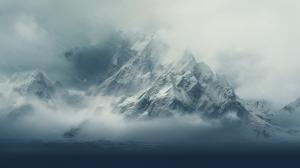 snowy mountain with fog