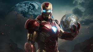 iron man looking like a giant holding earth in his hand 

