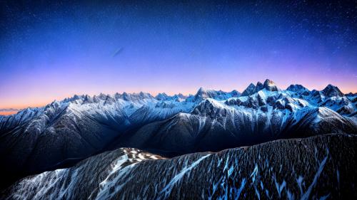 Snowy mountains in the night