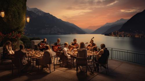 large balcony with family and friends eating food and enjoying traditional music being played by a  stringed quartet. Lake Garda in the background with high mountains at sunset.