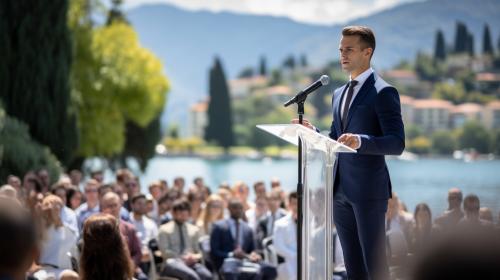 Man standing in a suit with rostrum and stand with microphone on it, many Jehovah's witnesses gathered for exercise patience 2023 convention of Jehovah's Witnesses at a outdoor venue at Lake Garda Northern Italy.