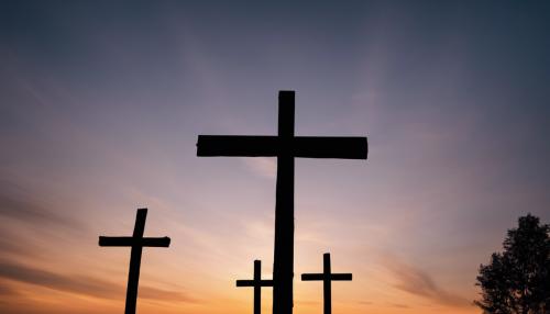 Silhouette of the three crosses during a sunset 