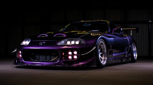 fully carbon fibre supra mkii with exposed engine and purple underlighting
