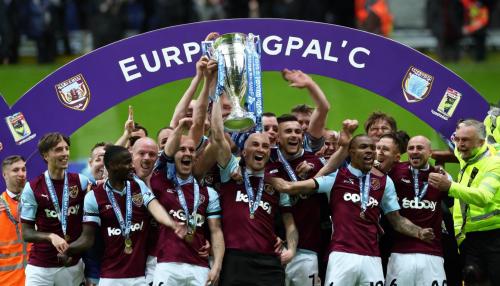 Westham united lifting the europa conference trophy