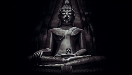 A giant lord buddha in dark background